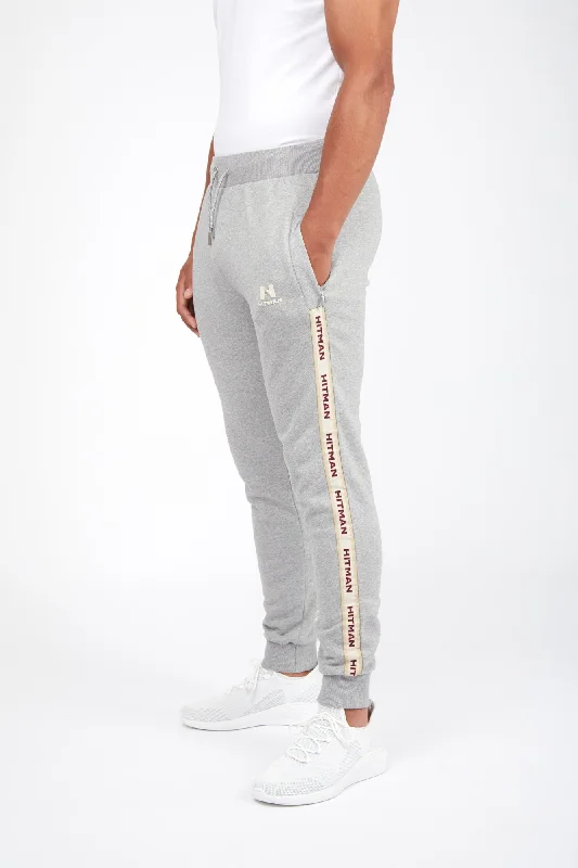 GREY JOGGERS- CREAM TAPE