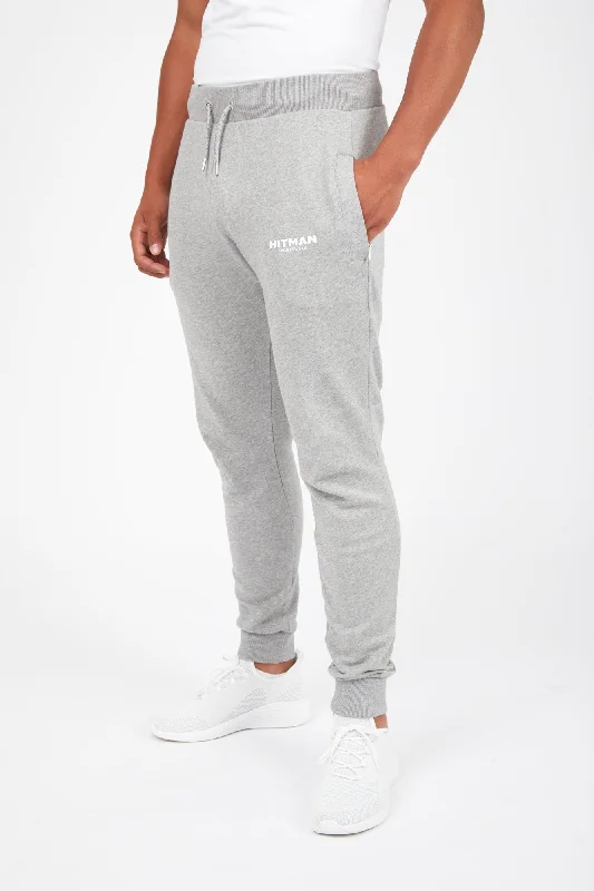 GREY JOGGERS- WHITE TEXT LOGO